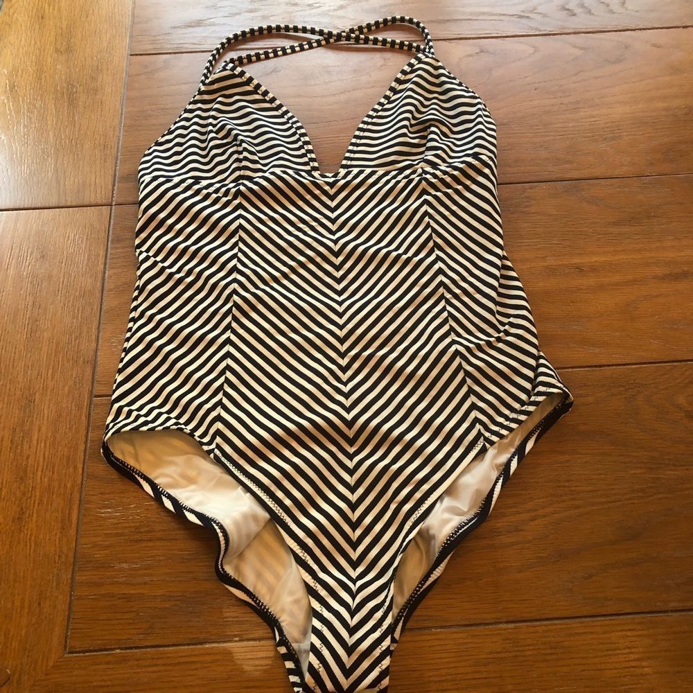 Tory Burch one piece swim suit. Navy and white stripes. Large. Used.